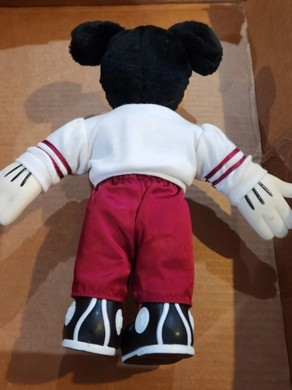 Football player Mickey and Disney Store Minnie